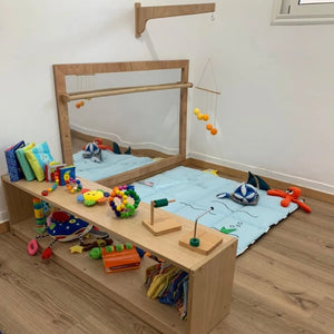 Miroir avec barre de brachiation
